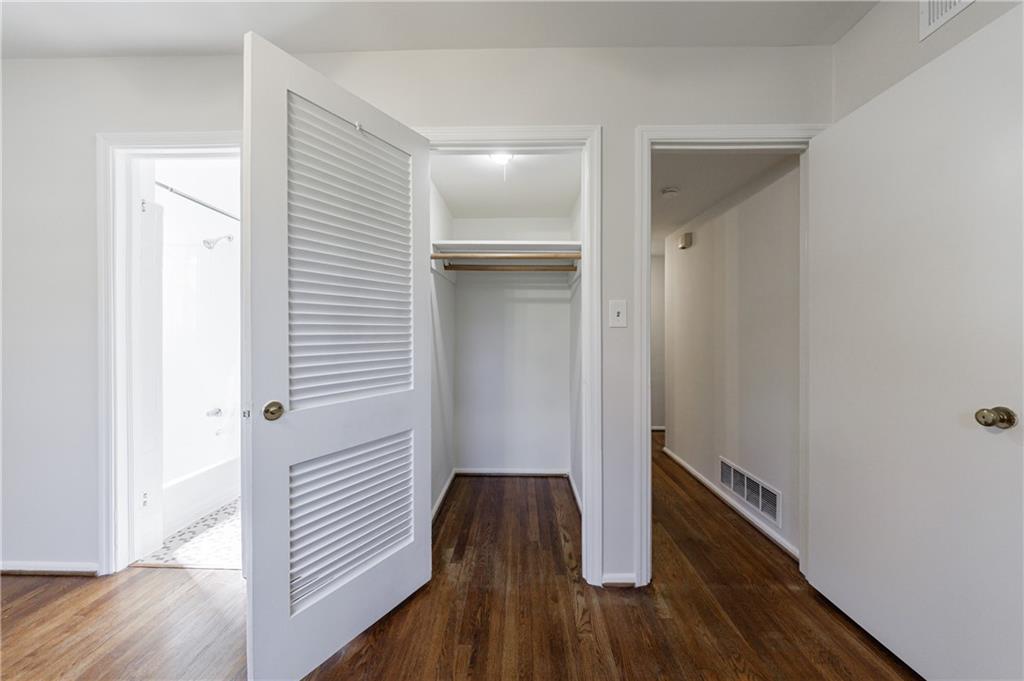 3660 Peachtree Road Northeast, Unit H2 Atlanta, GA 30319 - Photo 30 of 55 a view of a hallway with wooden floor
