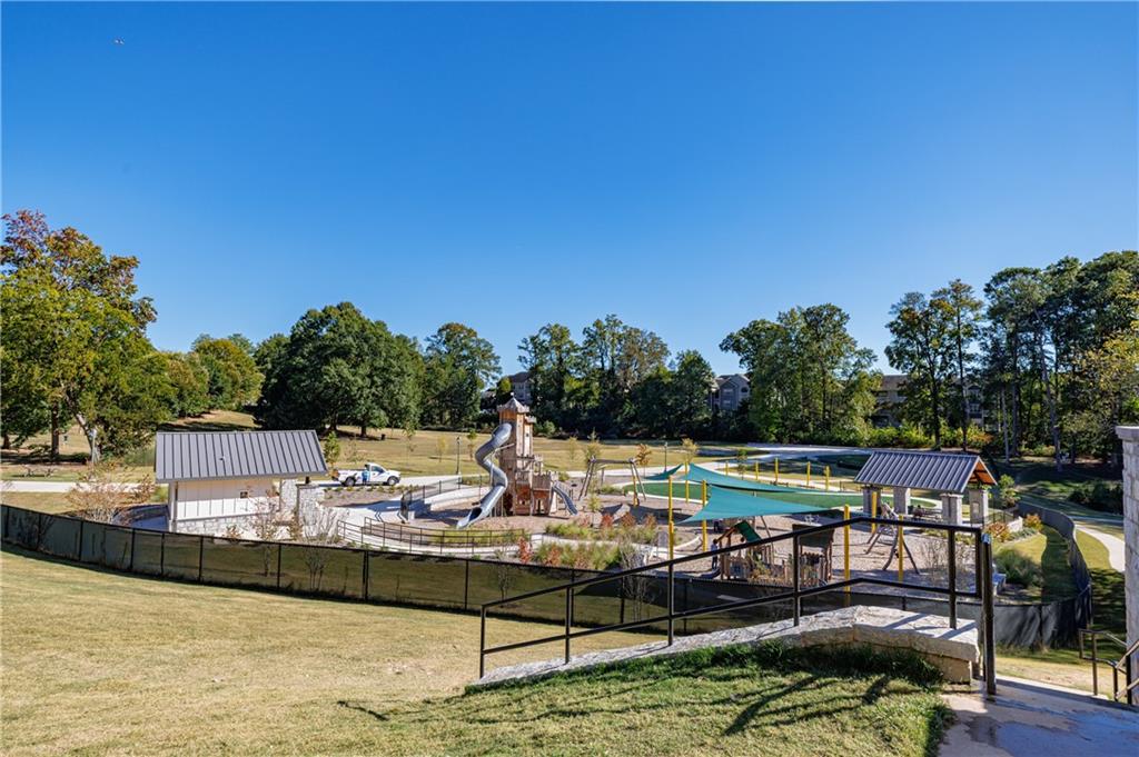 3660 Peachtree Road Northeast, Unit H2 Atlanta, GA 30319 - Photo 35 of 55 a view of a swimming pool with lounge chairs