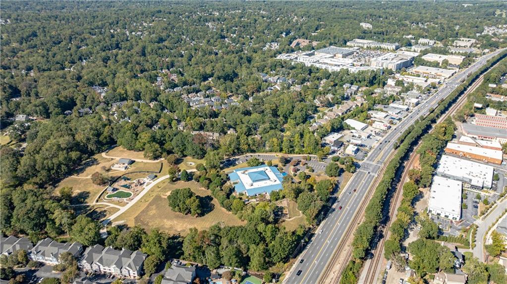 3660 Peachtree Road Northeast, Unit H2 Atlanta, GA 30319 - Photo 40 of 55 an aerial view of a residential houses with outdoor space and trees