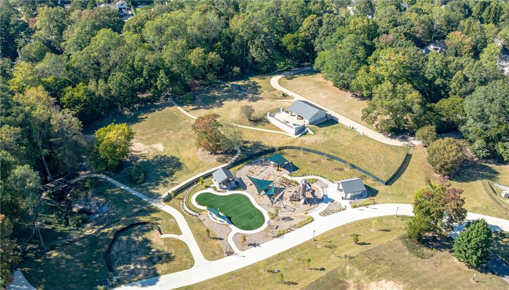 3660 Peachtree Road Northeast, Unit H2 Atlanta, GA 30319 - Photo 52 of 55 an aerial view of a house with yard swimming pool and outdoor seating