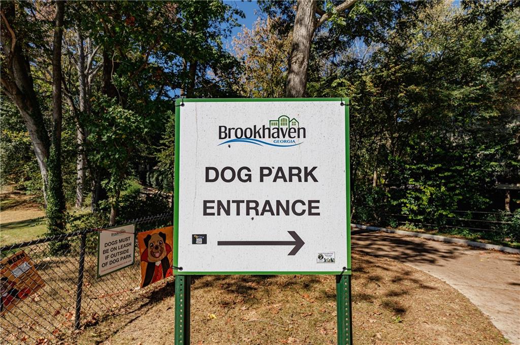 3660 Peachtree Road Northeast, Unit H2 Atlanta, GA 30319 - Photo 53 of 55 a sign on the side of a road