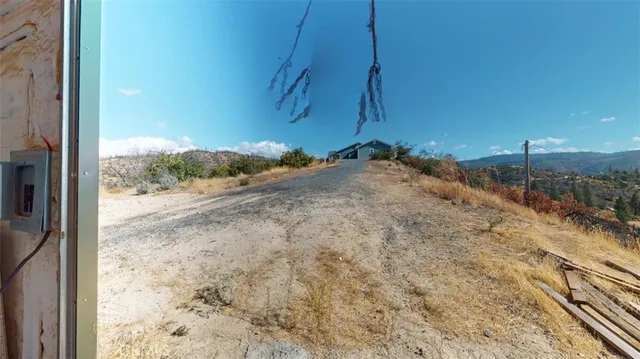 a kitchen with stainless steel appliances granite countertop a stove microwave and refrigerator