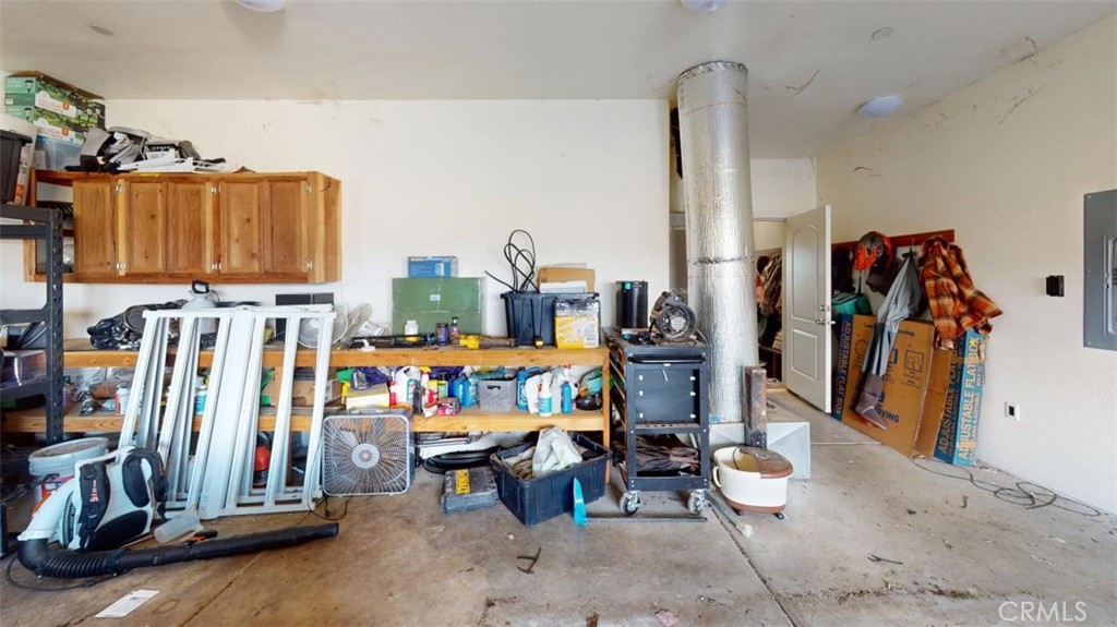 1289 Lumpkin Road Oroville, CA 95966 - Photo 58 of 74 a view of walk in closet with clothes and shoes