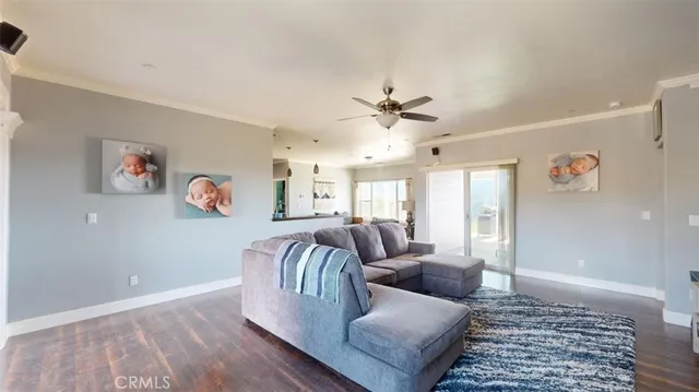 a kitchen with stainless steel appliances granite countertop a sink refrigerator and cabinets