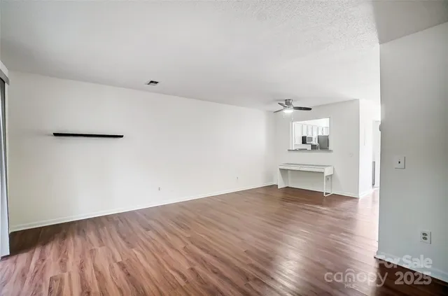 a view of wooden floor and a workspace in wooden floor