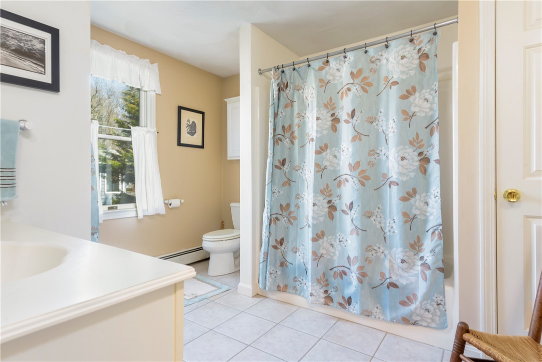 17 Beach Plum Road Narragansett, RI 02882 - Photo 7 of 20 Large first floor full bathroom with laundry.