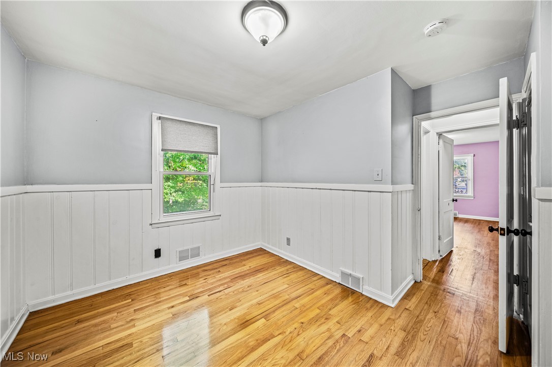 1796 Lander Road Mayfield Heights, OH 44124 - Photo 20 of 39 Spare room featuring light wood-type flooring and a healthy amount of sunlight