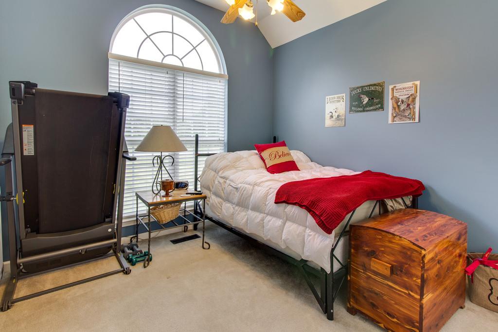 392 Cedar Grove Road Lebanon, TN 37087 - Photo 17 of 28 a bedroom with a bed and a window