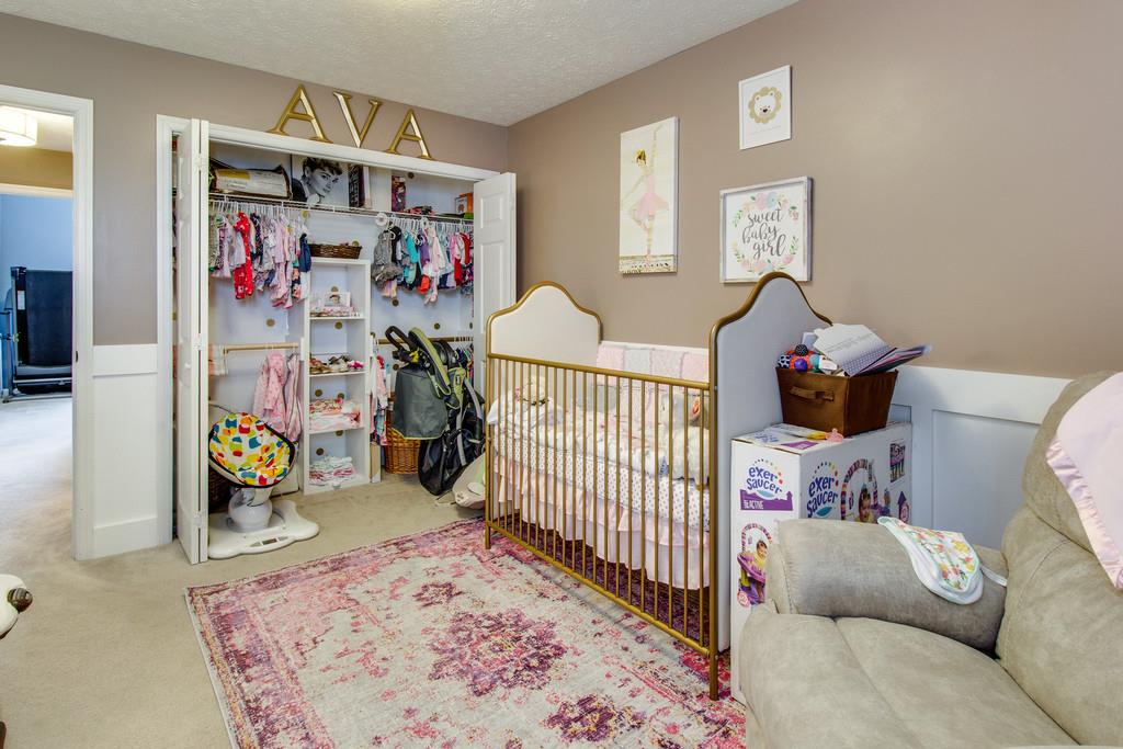 392 Cedar Grove Road Lebanon, TN 37087 - Photo 20 of 28 a bedroom with furniture and a window