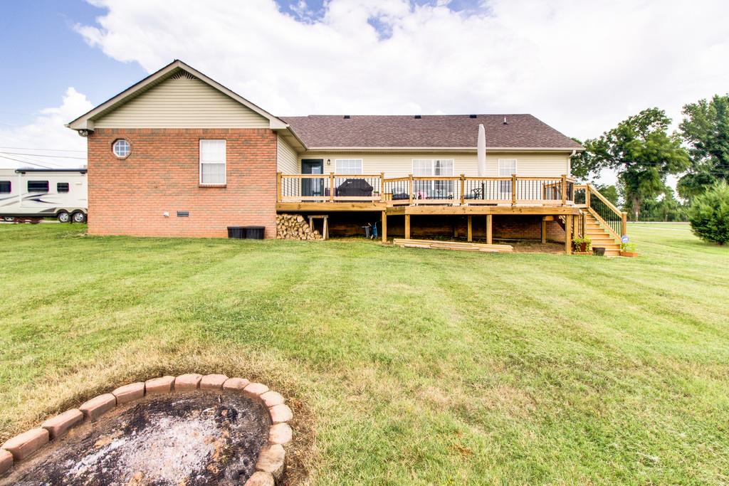 392 Cedar Grove Road Lebanon, TN 37087 - Photo 24 of 28 a view of a house with a backyard