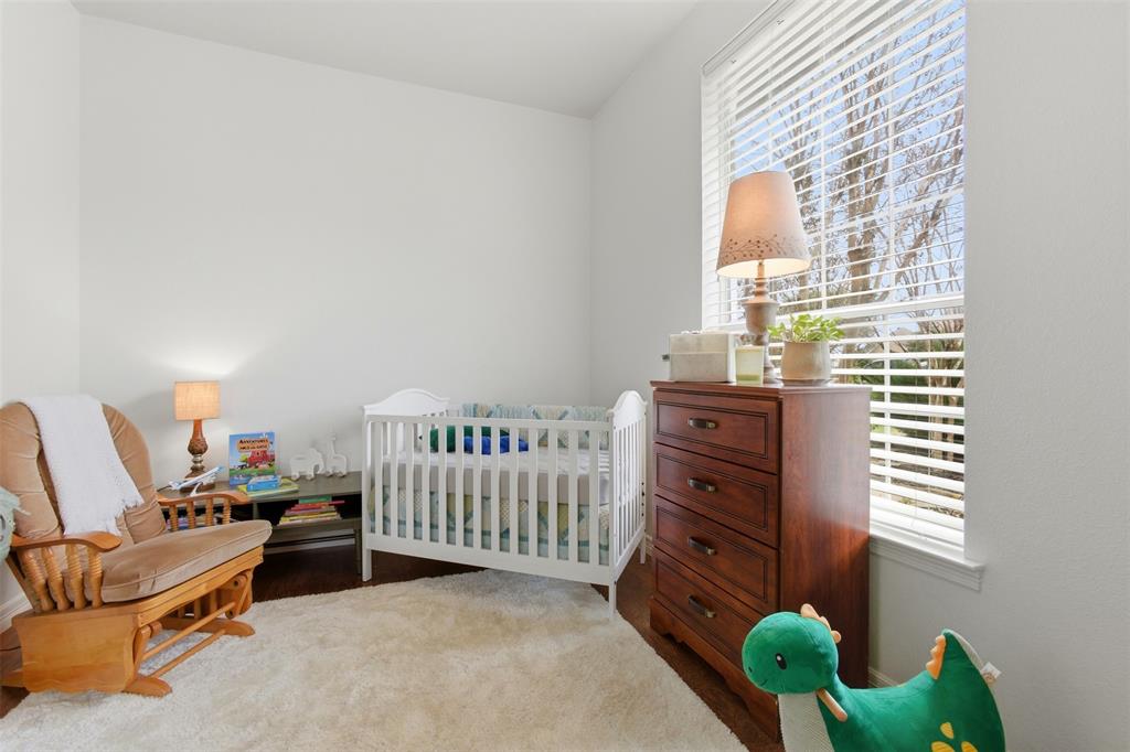 906 Valley View Avenue Red Oak, TX 75154 - Photo 16 of 40 This room is connected to the Primary Bedroom. It can be used as a nursery, a sitting room or an office.