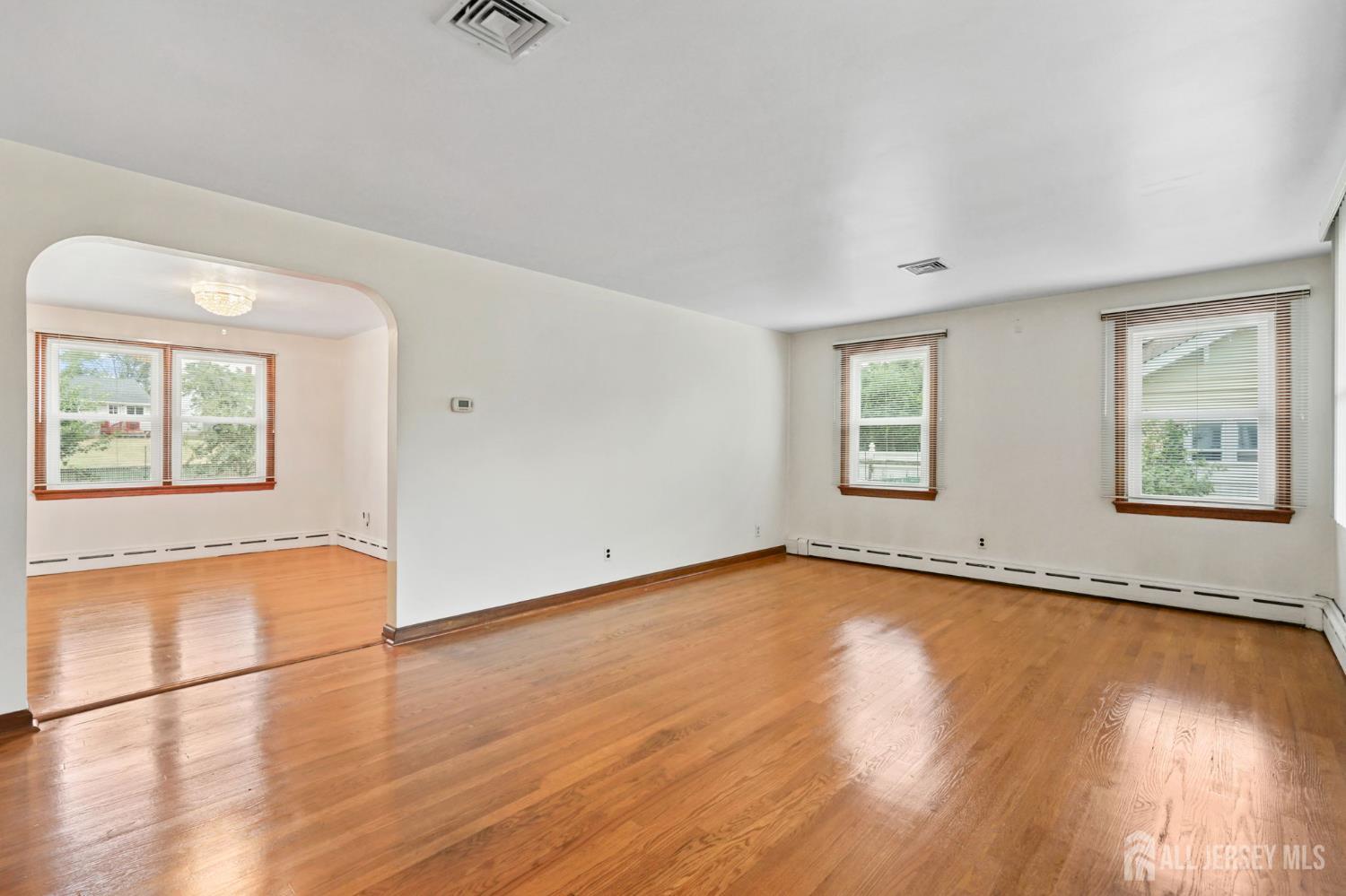 21 Reed Street Edison, NJ 08817 - Photo 5 of 27 a view of a room with wooden floor and window
