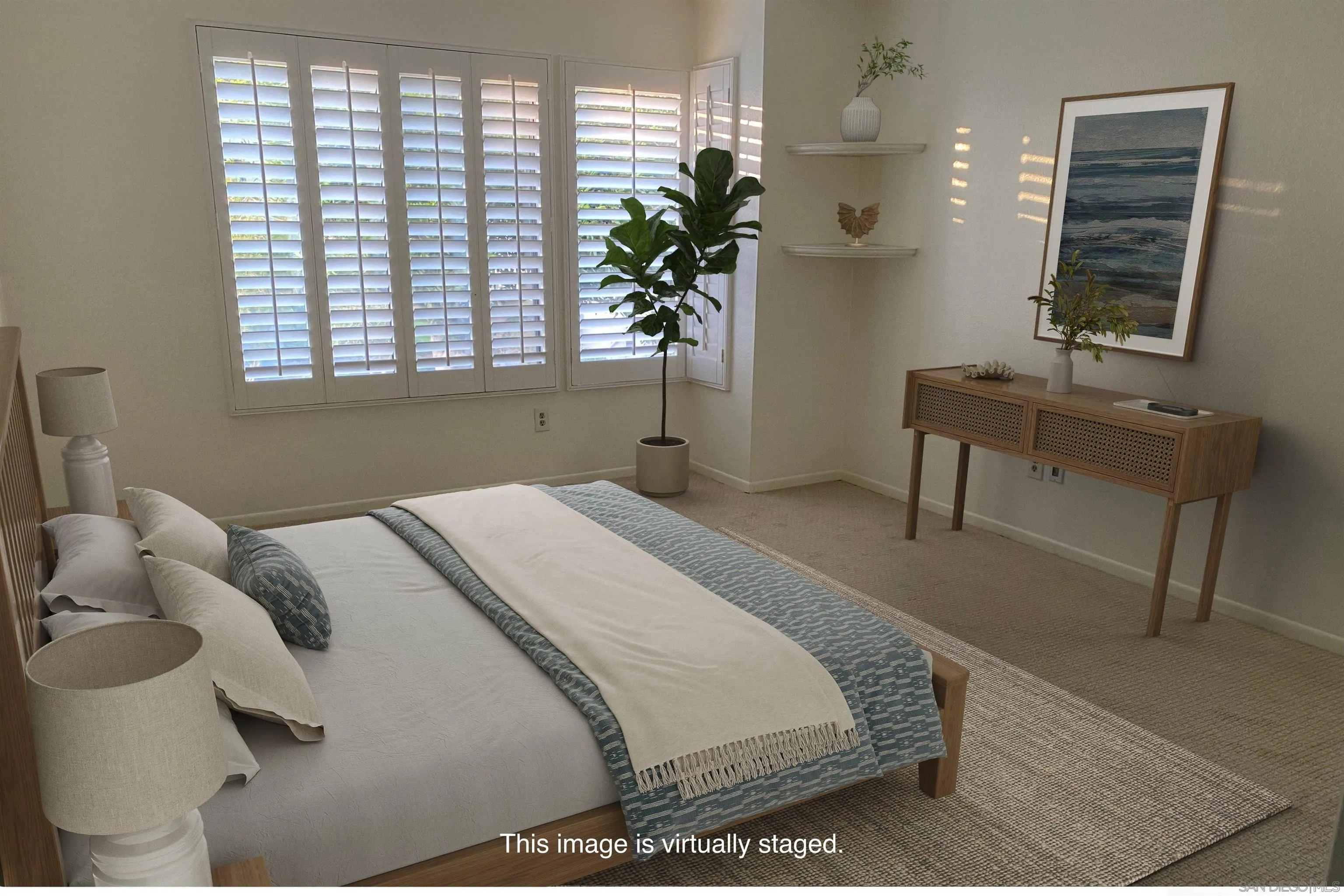 928 Intrepid Court Del Mar, CA 92014 - Photo 12 of 27 a bedroom with a bed and a potted plant