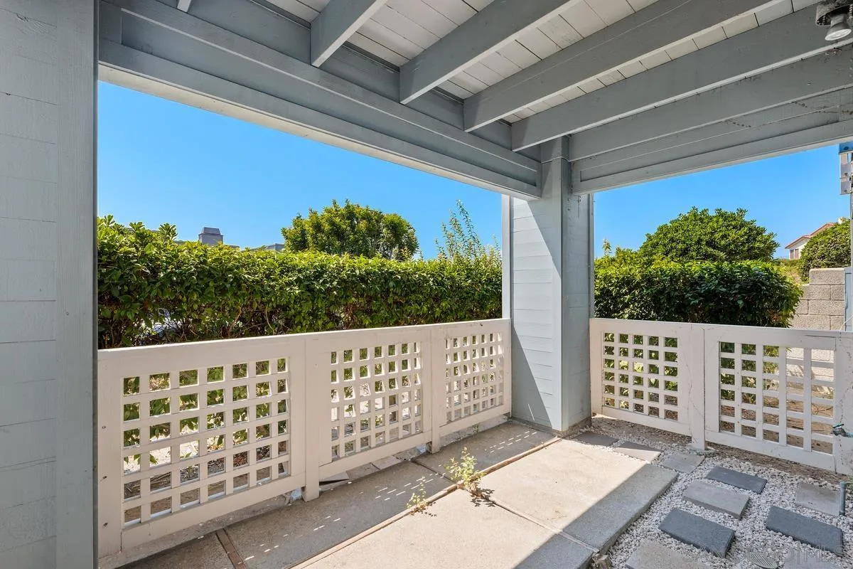 928 Intrepid Court Del Mar, CA 92014 - Photo 21 of 27 a view of a wooden fence and trees