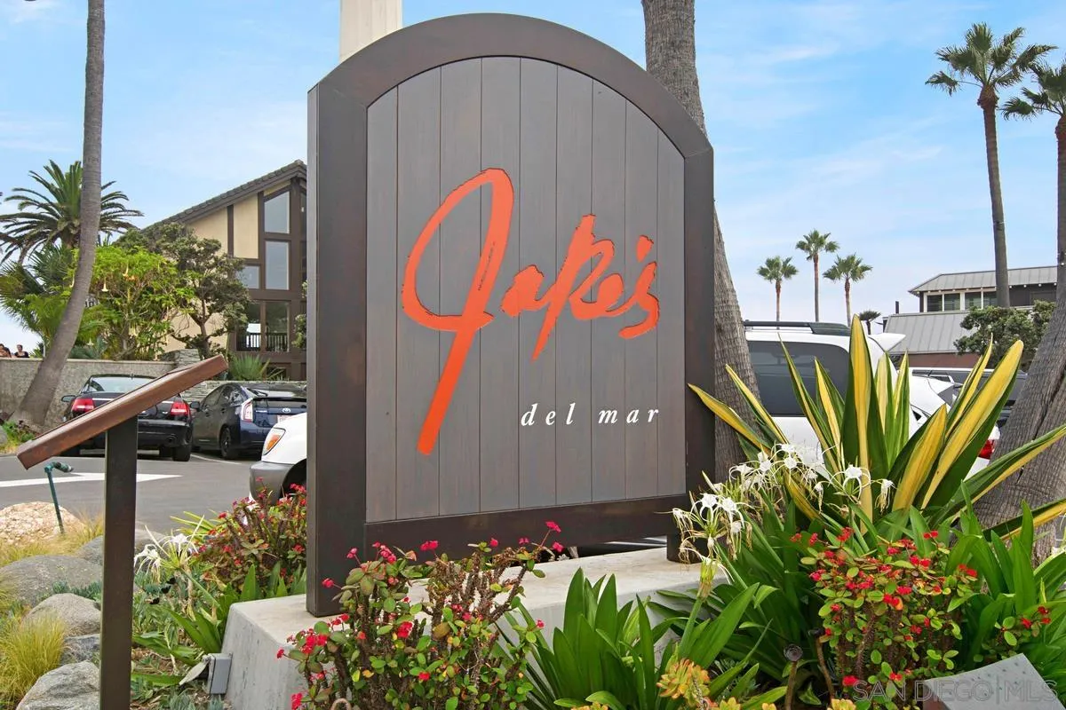 928 Intrepid Court Del Mar, CA 92014 - Photo 27 of 27 a sign that is on the wooden wall