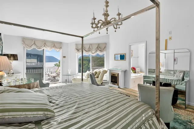 a view of a room with gym equipment and a large window