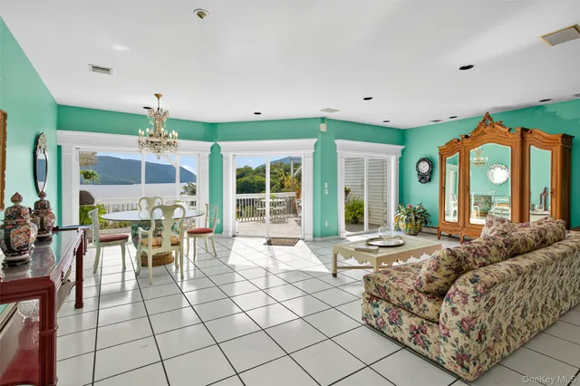 a kitchen with stainless steel appliances granite countertop a sink a refrigerator and a stove