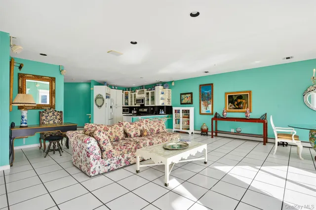 a living room with furniture and a table