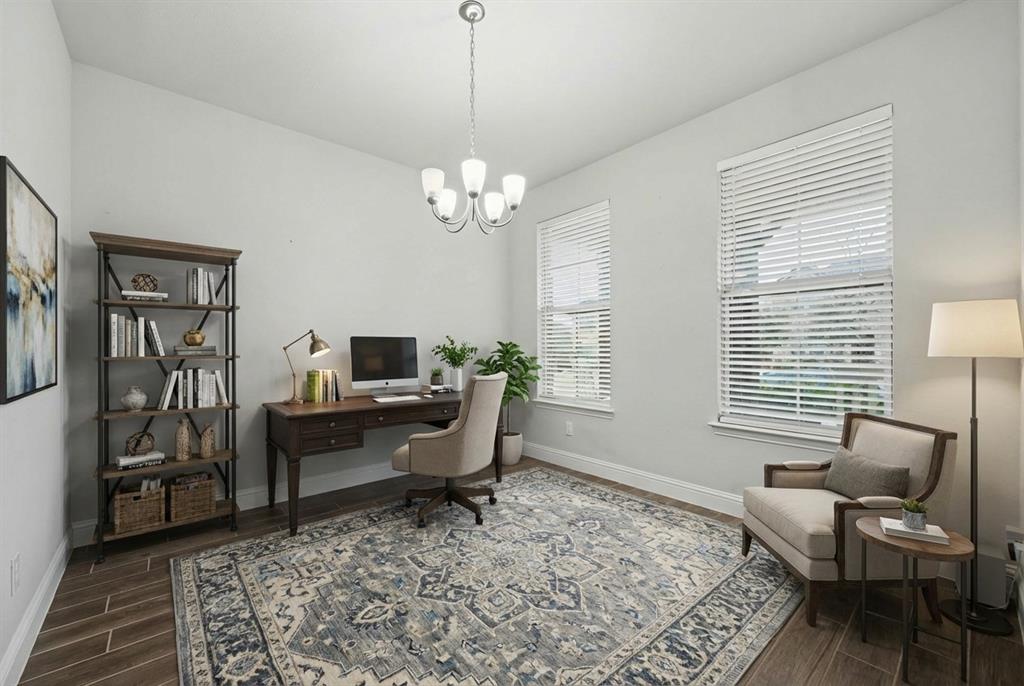 433 Forestridge Drive Fate, TX 75087 - Photo 6 of 38 a workspace with wooden floor