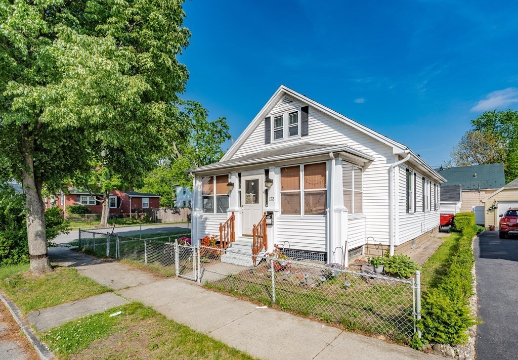 123 Wilber Street Springfield, MA 01104 - Photo 2 of 27 a front view of a house with a porch