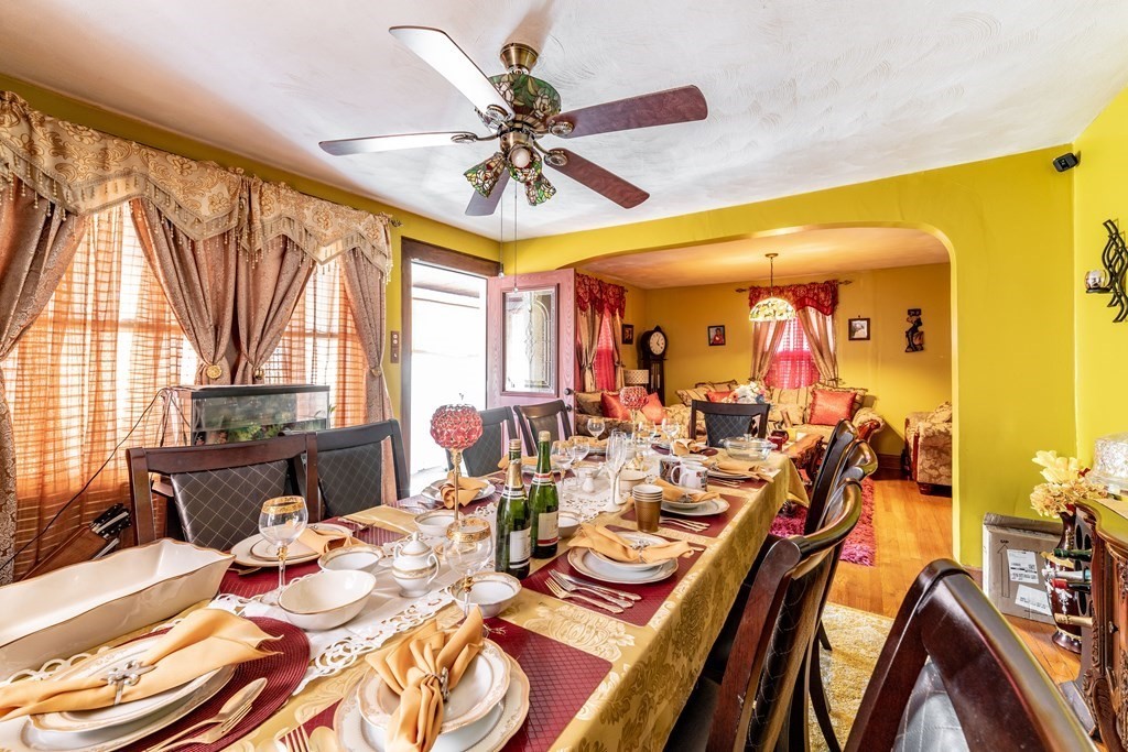 123 Wilber Street Springfield, MA 01104 - Photo 6 of 27 a dining room with wooden floor and large window