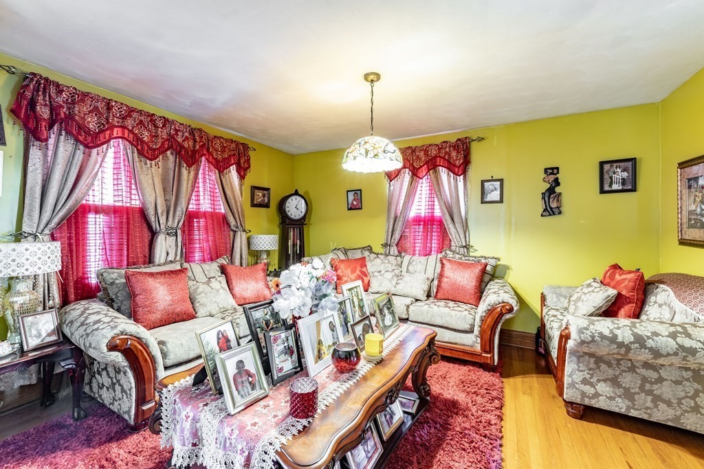123 Wilber Street Springfield, MA 01104 - Photo 7 of 27 a living room with furniture and a rug