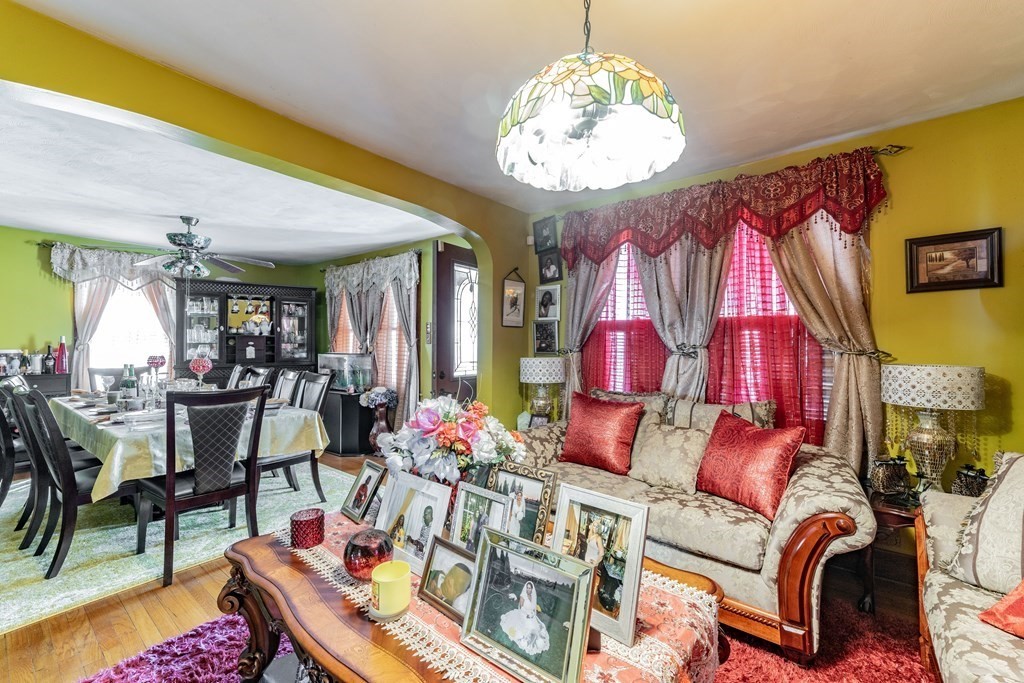 123 Wilber Street Springfield, MA 01104 - Photo 8 of 27 a living room with furniture chandelier and a chandelier