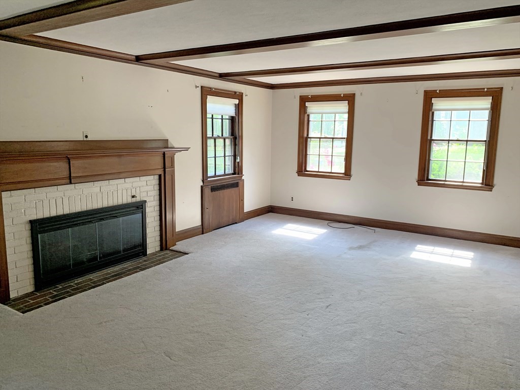 78 Whittier Road Wellesley, MA 02481 - Photo 13 of 27 a view of empty room with a fireplace