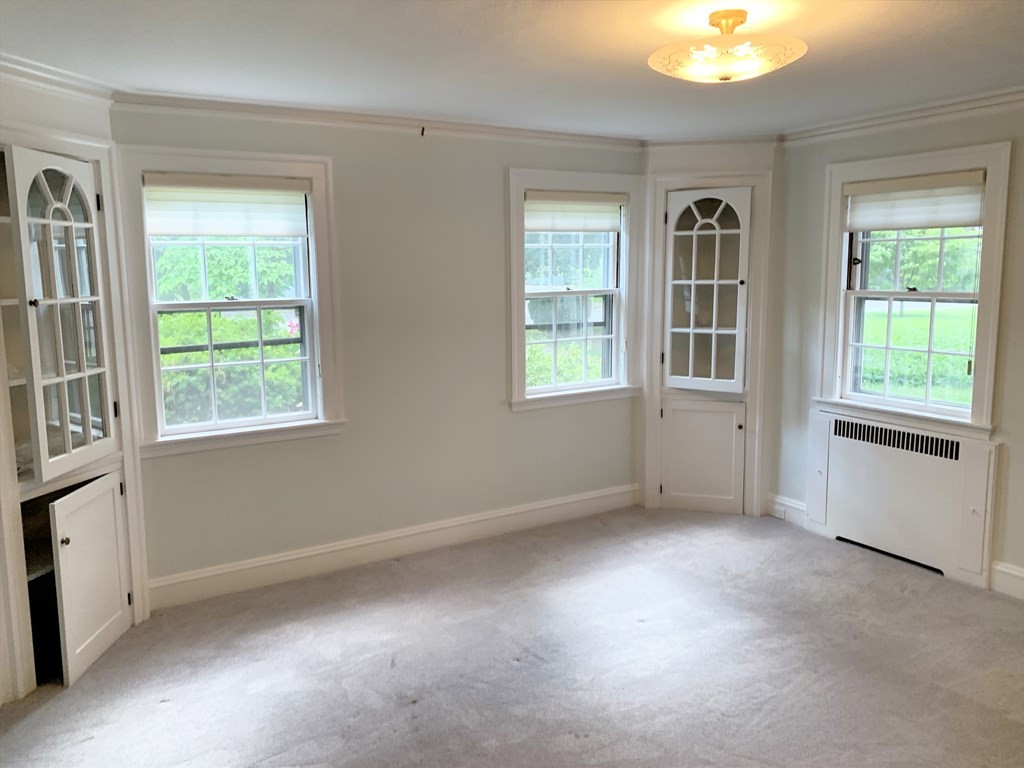 78 Whittier Road Wellesley, MA 02481 - Photo 15 of 27 an empty room with windows