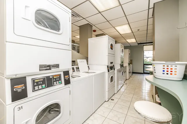 a bathroom with a sink a toilet and bathtub