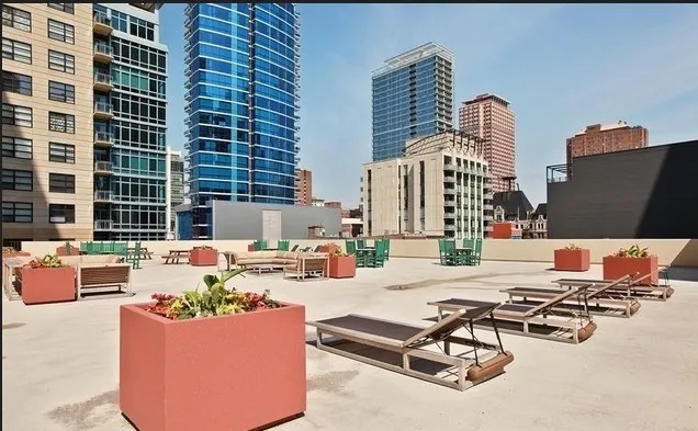 a view of a swimming pool with a lounge chair