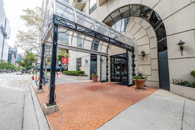 a view of a building with sitting area