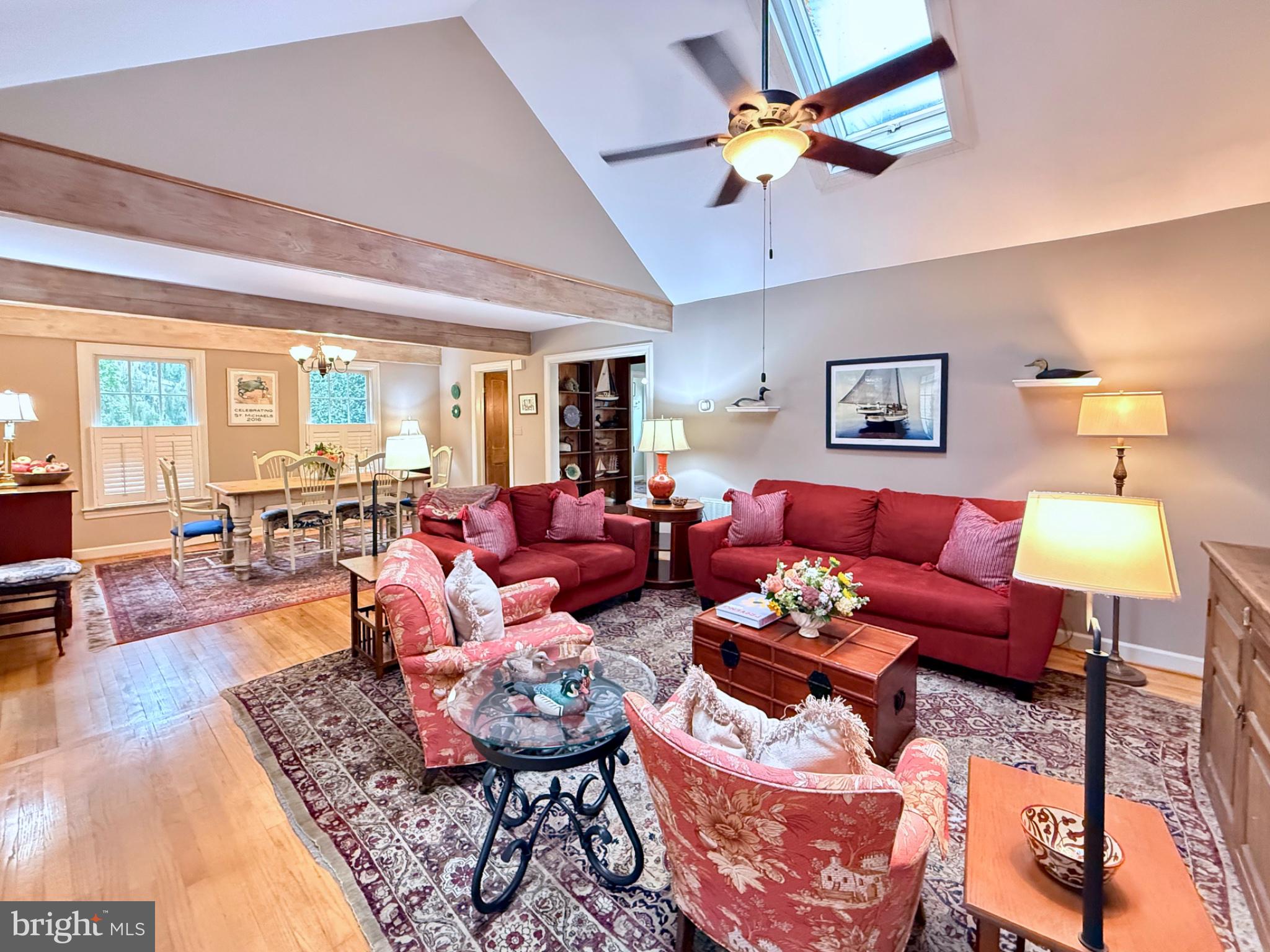 700 South Talbot Street St. Michaels, MD 21663 - Photo 23 of 83 Living space w/ cathedral ceilings & exposed beams