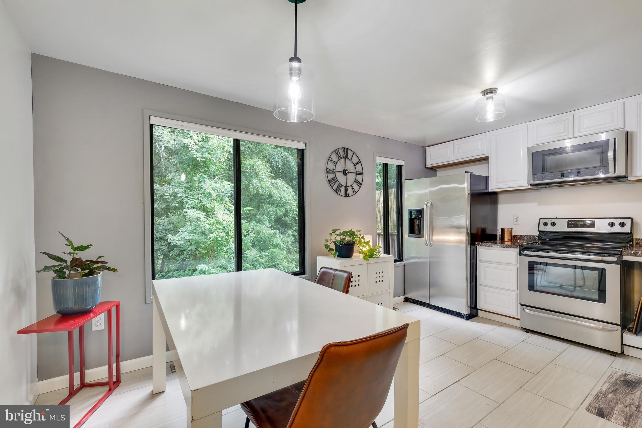 10755 Lester Street Silver Spring, MD 20902 - Photo 5 of 37 OPEN DINING AREA