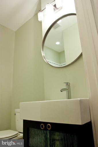 1917 2nd Street Northeast, Unit 201 Washington, DC 20002 - Photo 12 of 23 a bathroom with a sink and a mirror
