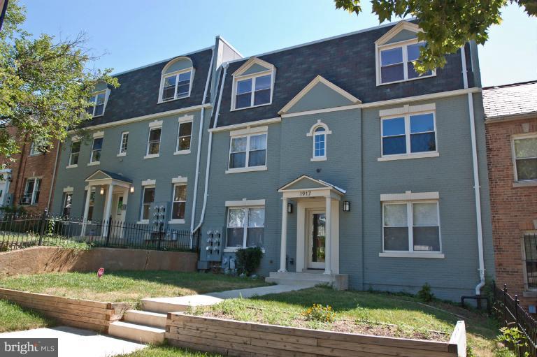 1917 2nd Street Northeast, Unit 201 Washington, DC 20002 - Photo 23 of 23 a front view of a house with garden