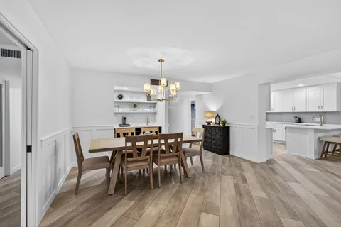 a kitchen with appliances and cabinets