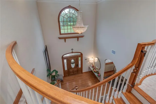a view of a porch with wooden floor