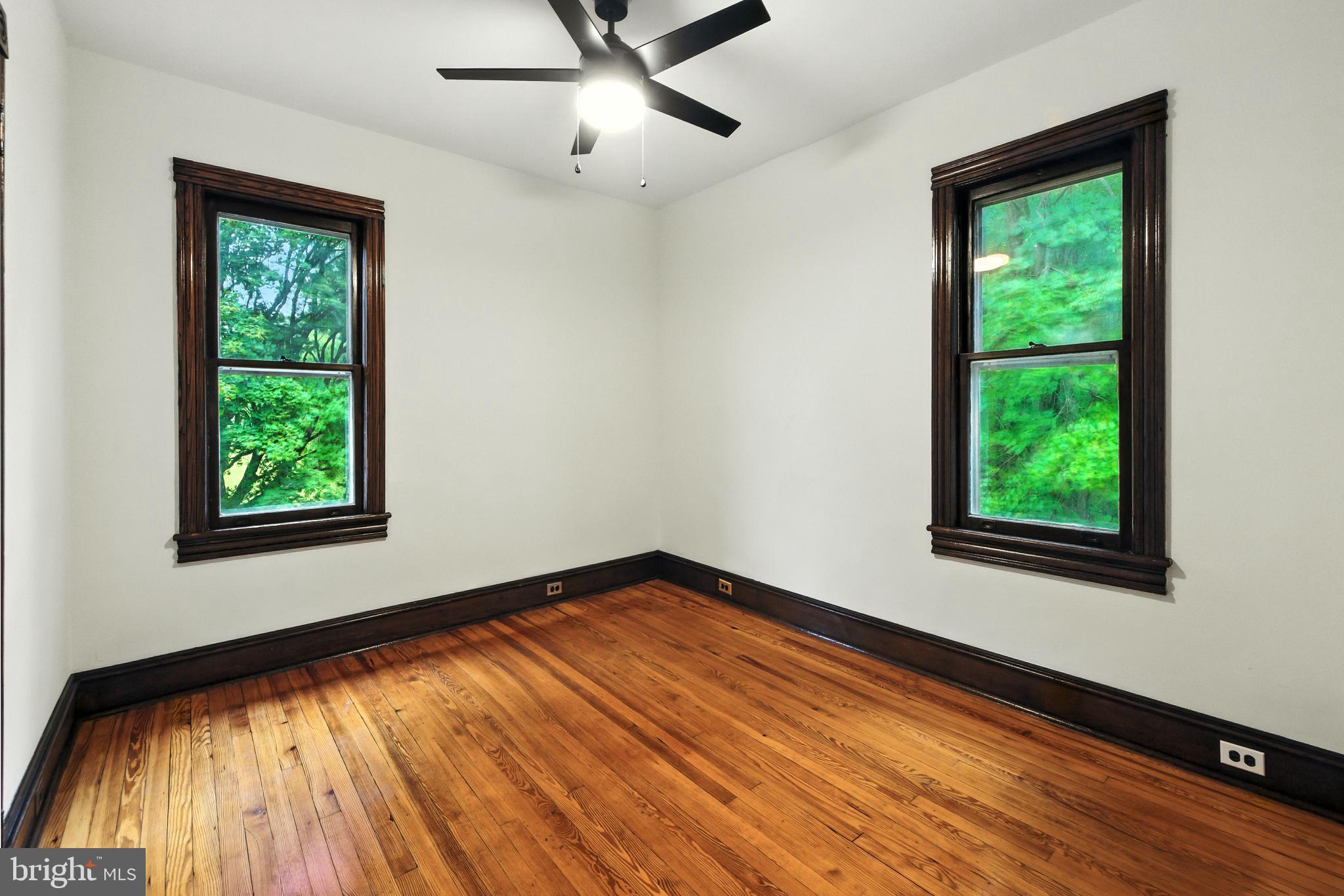 640 Mantua Boulevard Sewell, NJ 08080 - Photo 12 of 25 a view of an empty room with wooden floor and a window