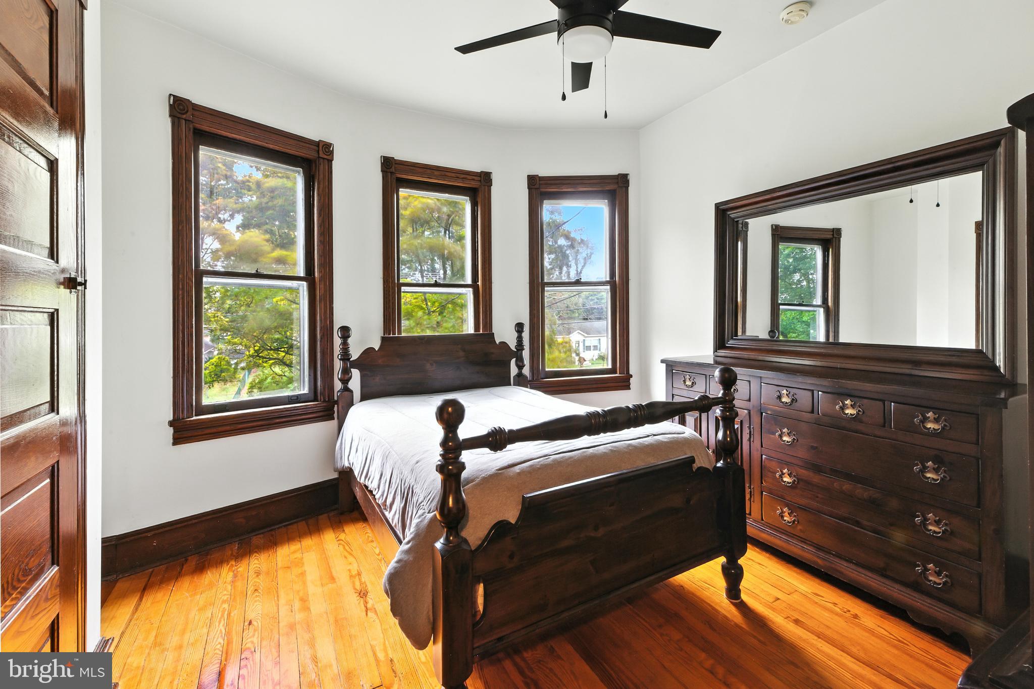 640 Mantua Boulevard Sewell, NJ 08080 - Photo 14 of 25 a bed sitting in a bedroom next to a window