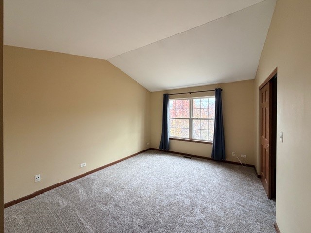 2418 Oneida Lane, Unit 2418 Naperville, IL 60563 - Photo 11 of 21 a view of an empty room with a window