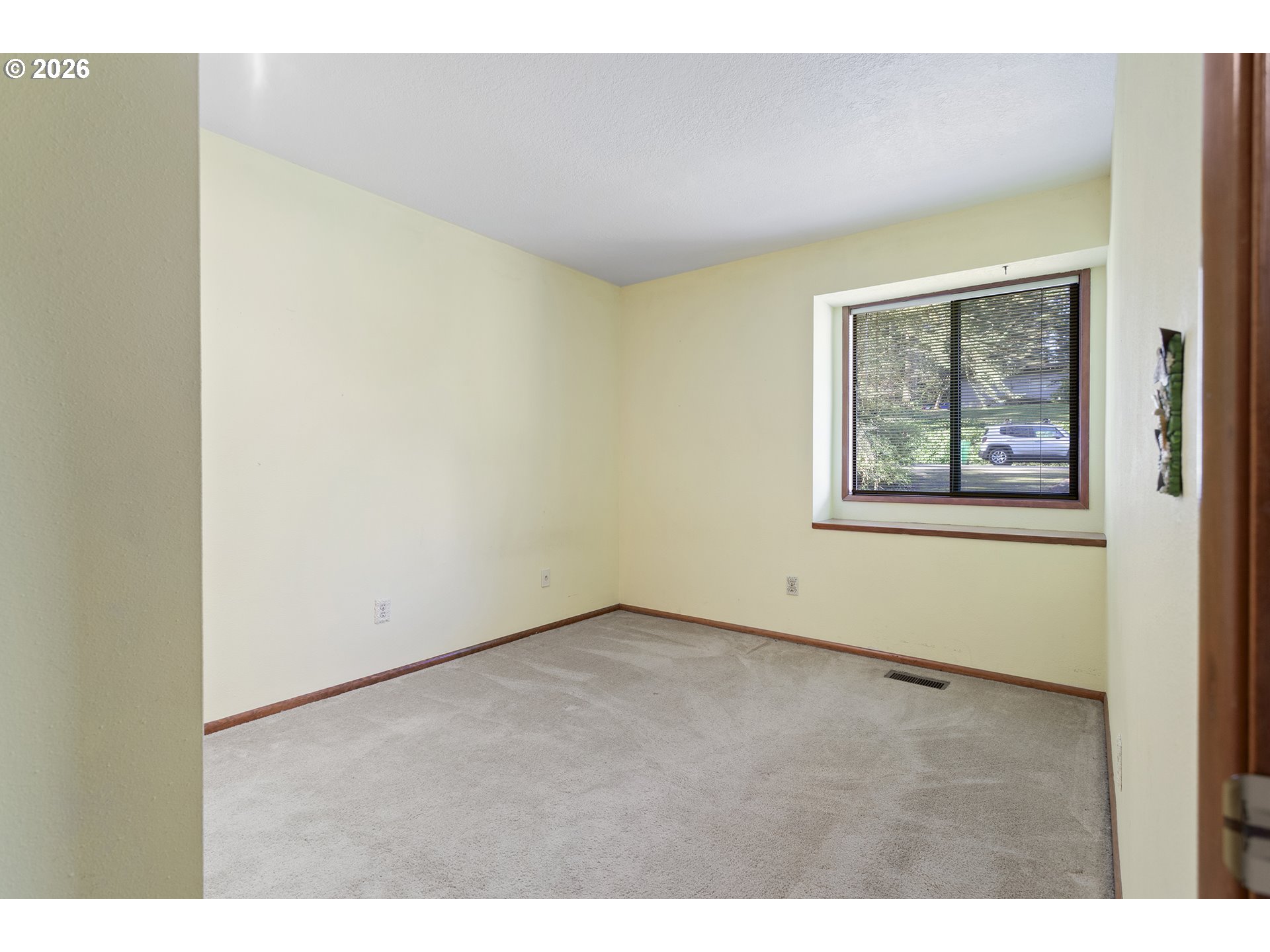 10410 Southwest 25th Avenue Portland, OR 97219 - Photo 37 of 39 a view of an empty room with a window