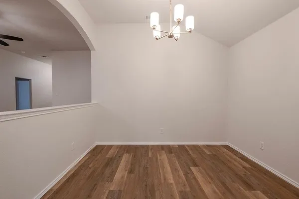 a view of a livingroom with wooden floor