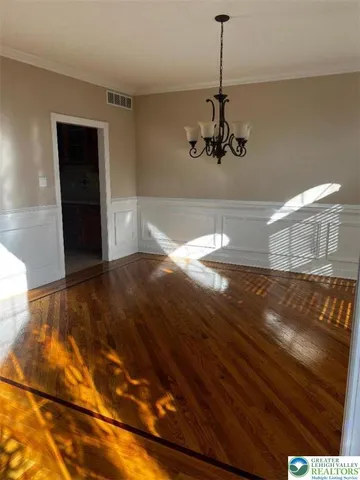 a vase of flowers sitting on a table