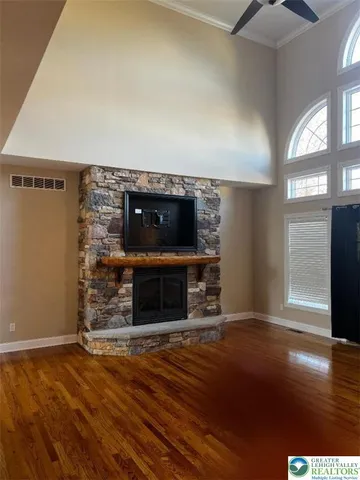 a living room with a fireplace