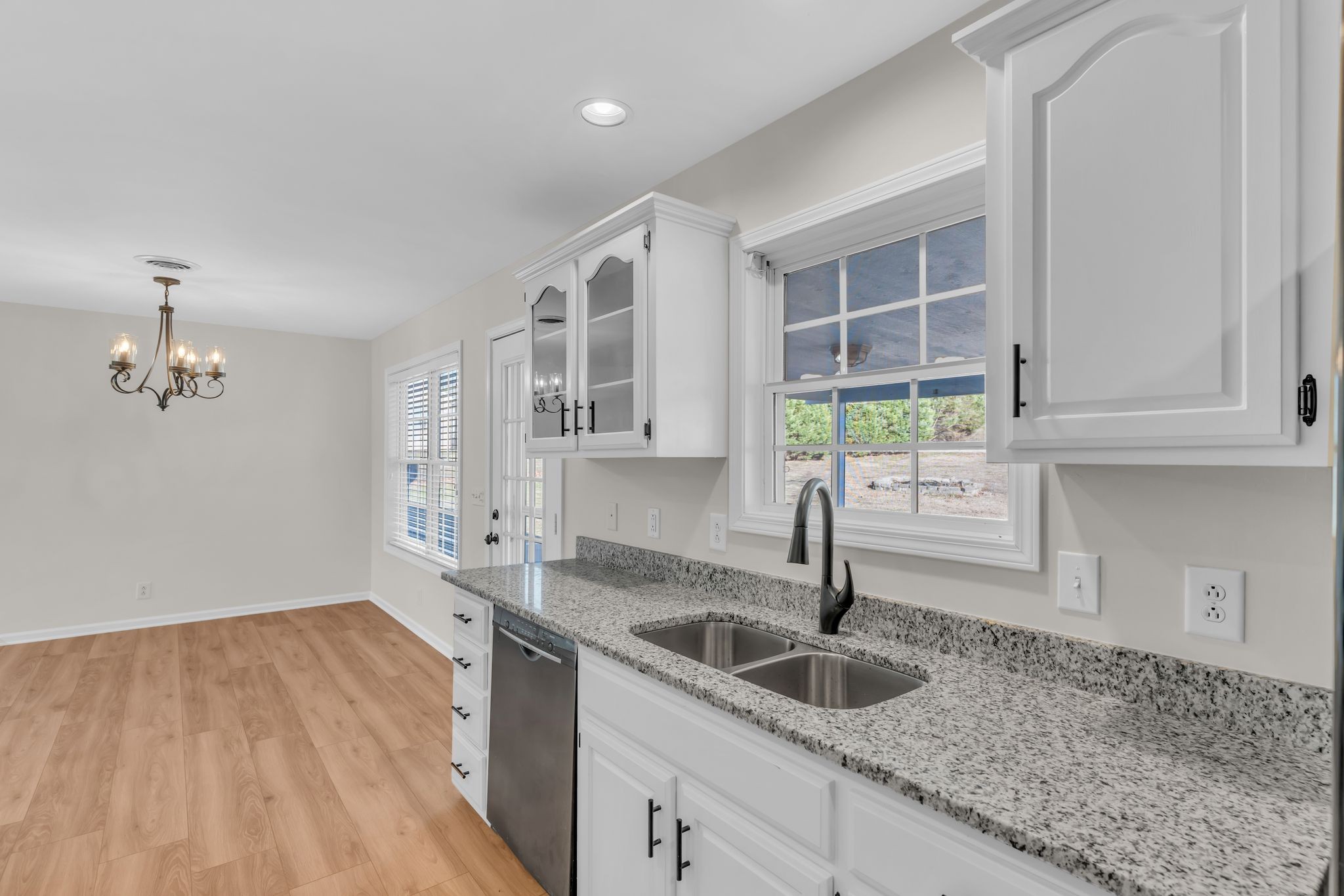 2765 Derby Run Road Springfield, TN 37172 - Photo 9 of 32 a kitchen with granite countertop a sink and a window