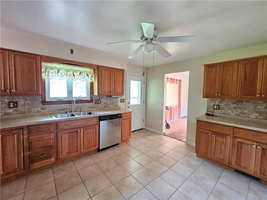 104 Easy Street Butler, PA 16001 - Photo 4 of 44 Kitchen exit to large covered patio.