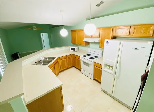 a view of a big room with carpet