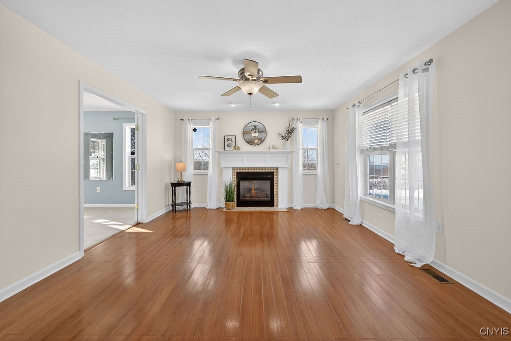 4326 Chilmark Street Marcellus, NY 13108 - Photo 13 of 49 Family room, cozy up in front of the gas fireplace