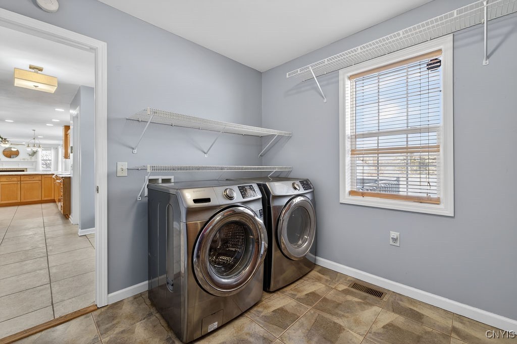 4326 Chilmark Street Marcellus, NY 13108 - Photo 25 of 49 First floor laundry room with shelving!